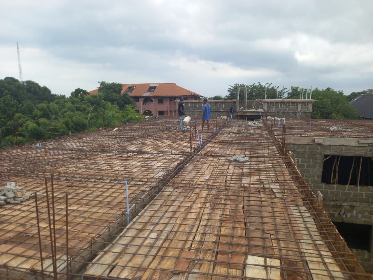 Roof slab rebar mesh with service conduits laid